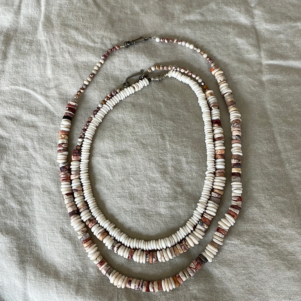 Set of three short shell necklaces.